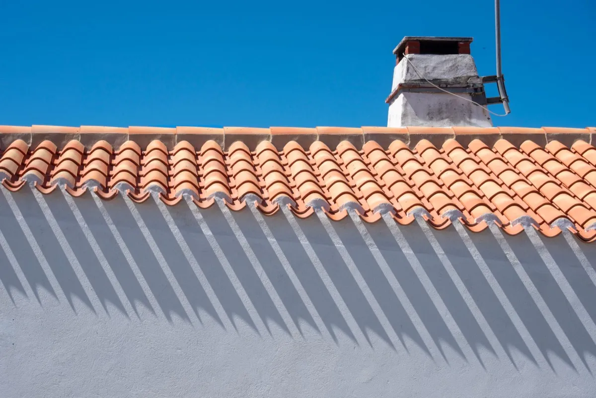Roof ridge line and chimney on a home in Medford, OR