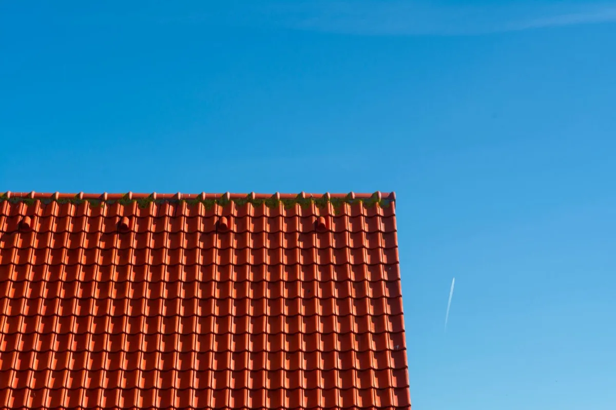 Tile roof gable in full sun, the kind of exposure that sets roof life in Medford, OR
